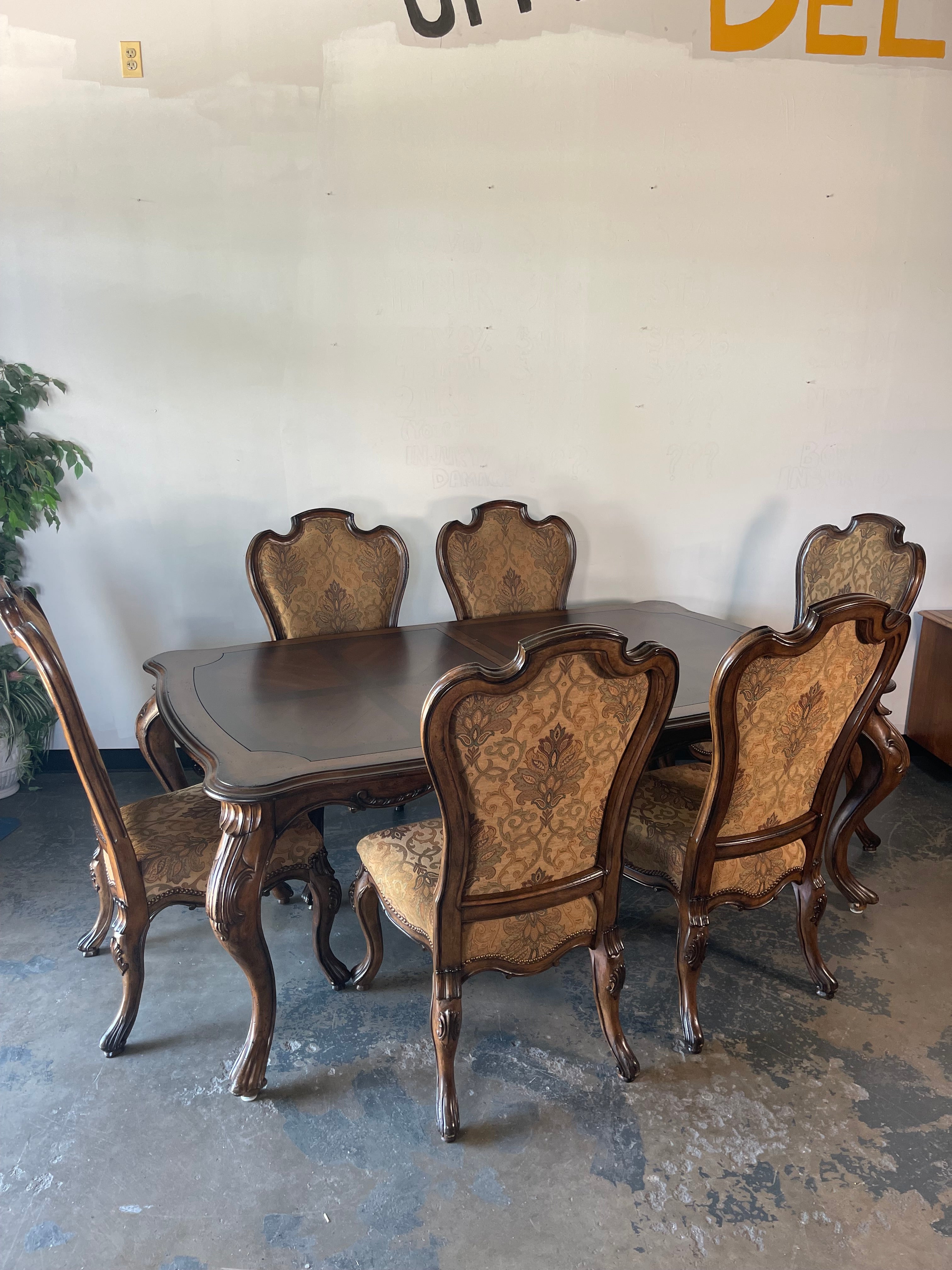 Ornate 8-Piece Dining Set with Two Leaves