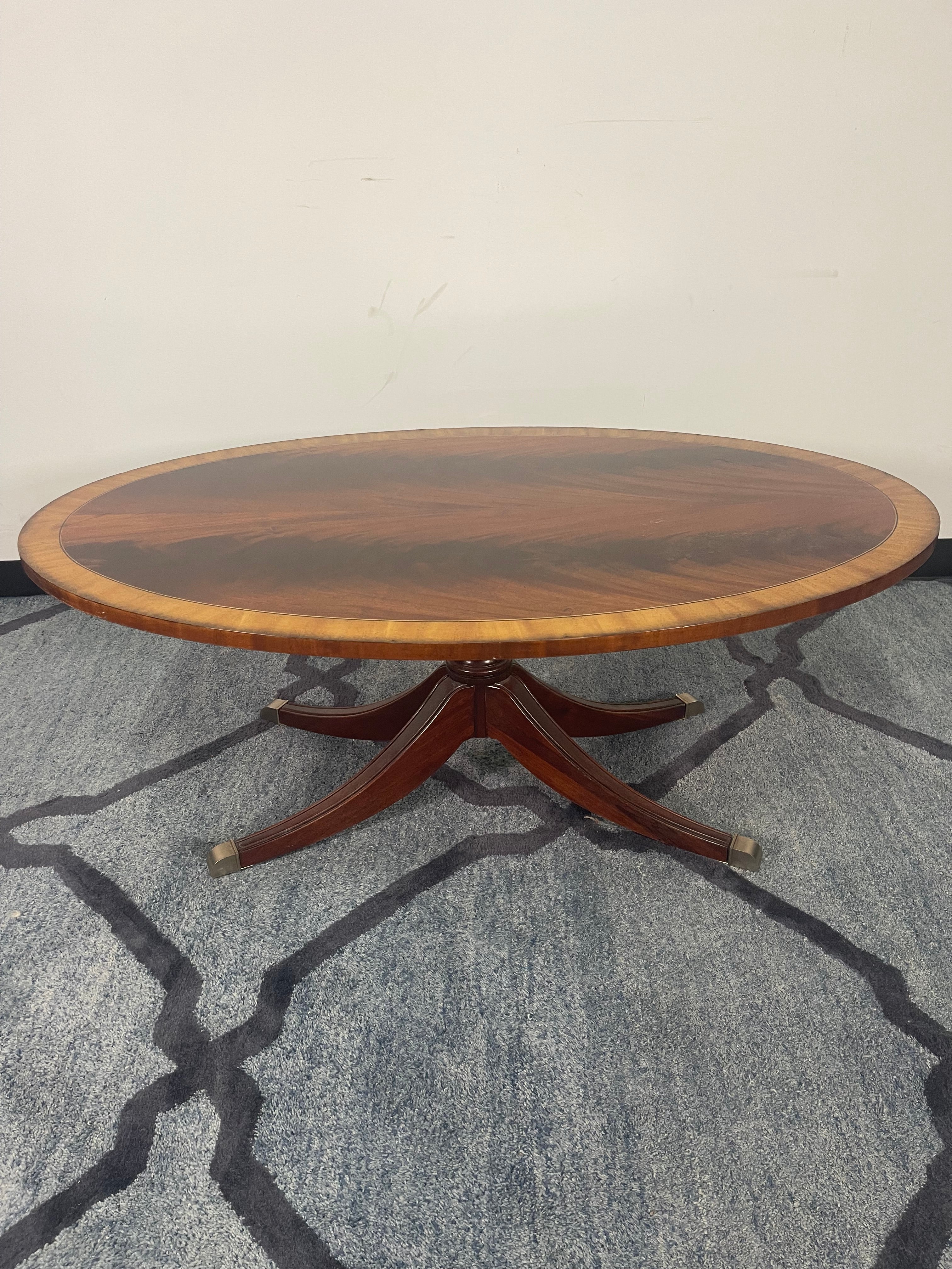 Flame Mahogany Duncan Phyfe Style Oval Coffee Table