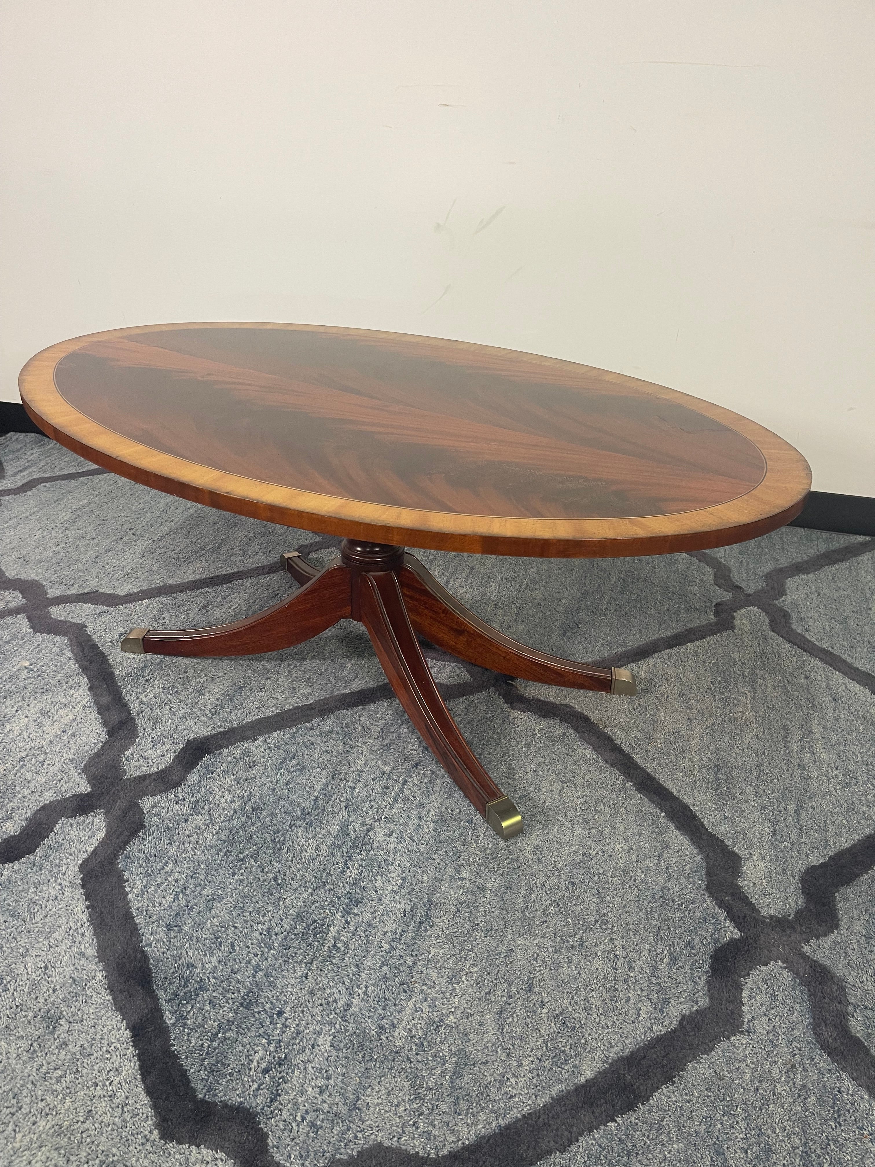 Flame Mahogany Duncan Phyfe Style Oval Coffee Table