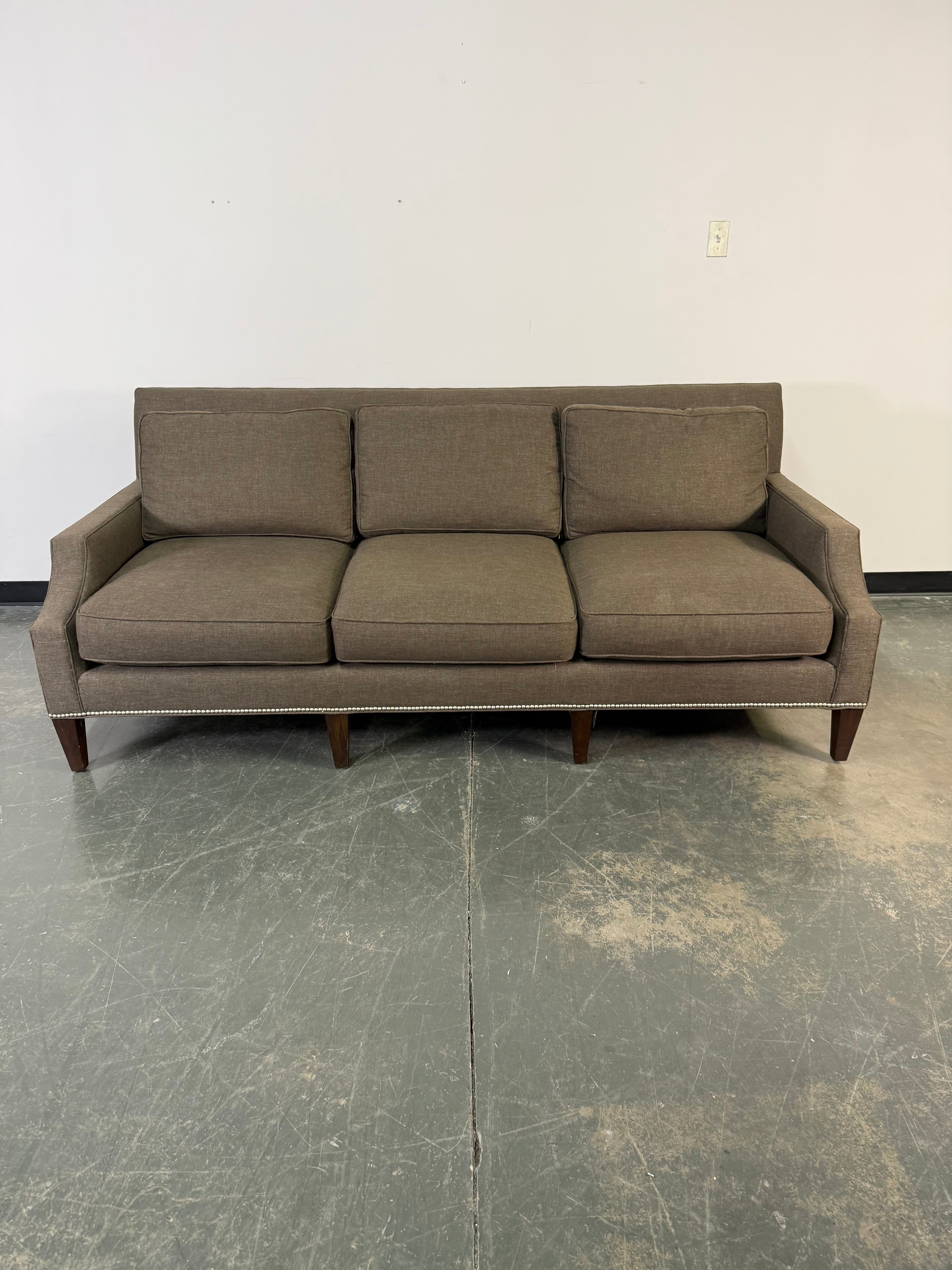 Elegant Three-Cushion Upholstered Sofa