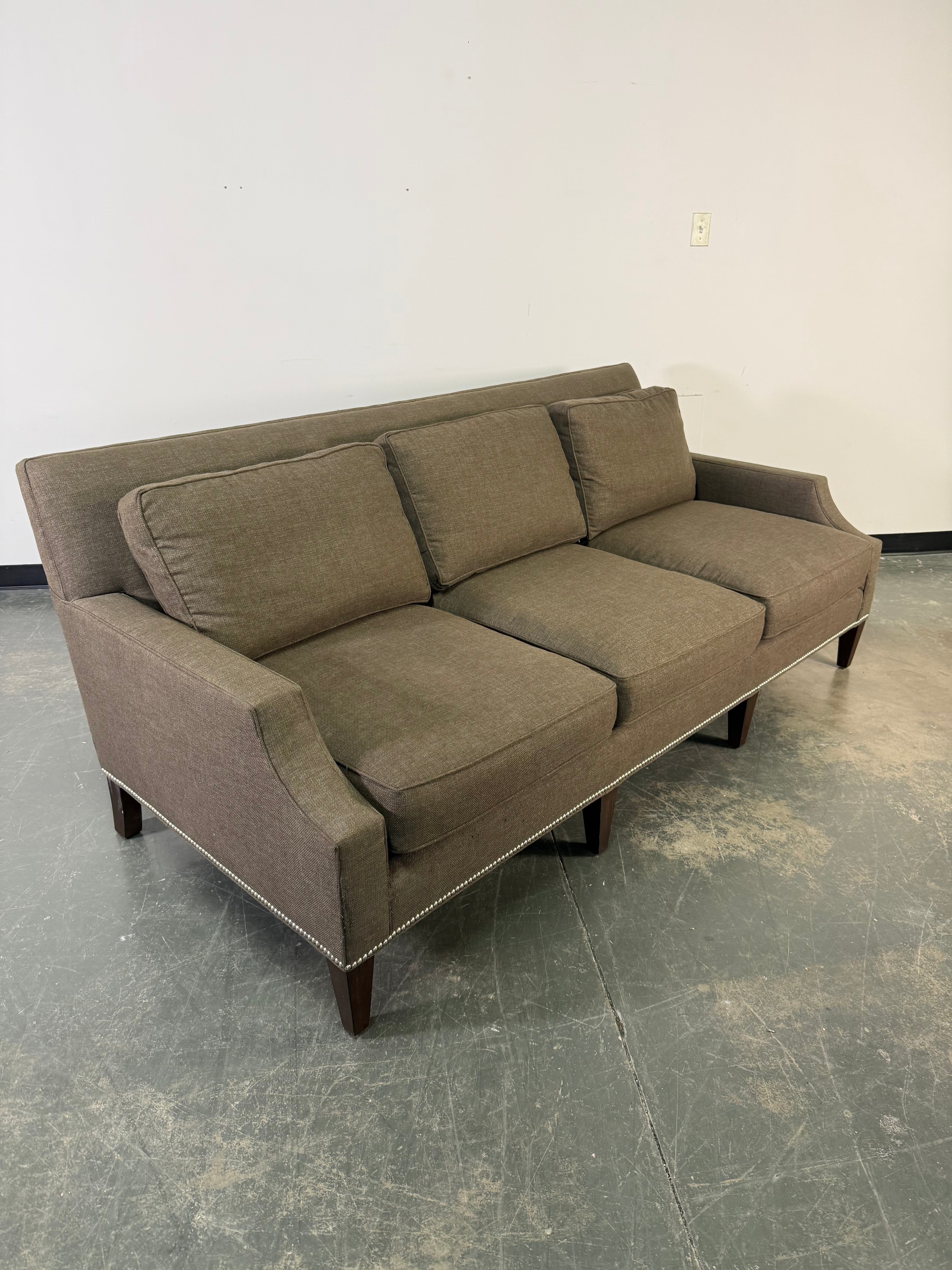 Elegant Three-Cushion Upholstered Sofa