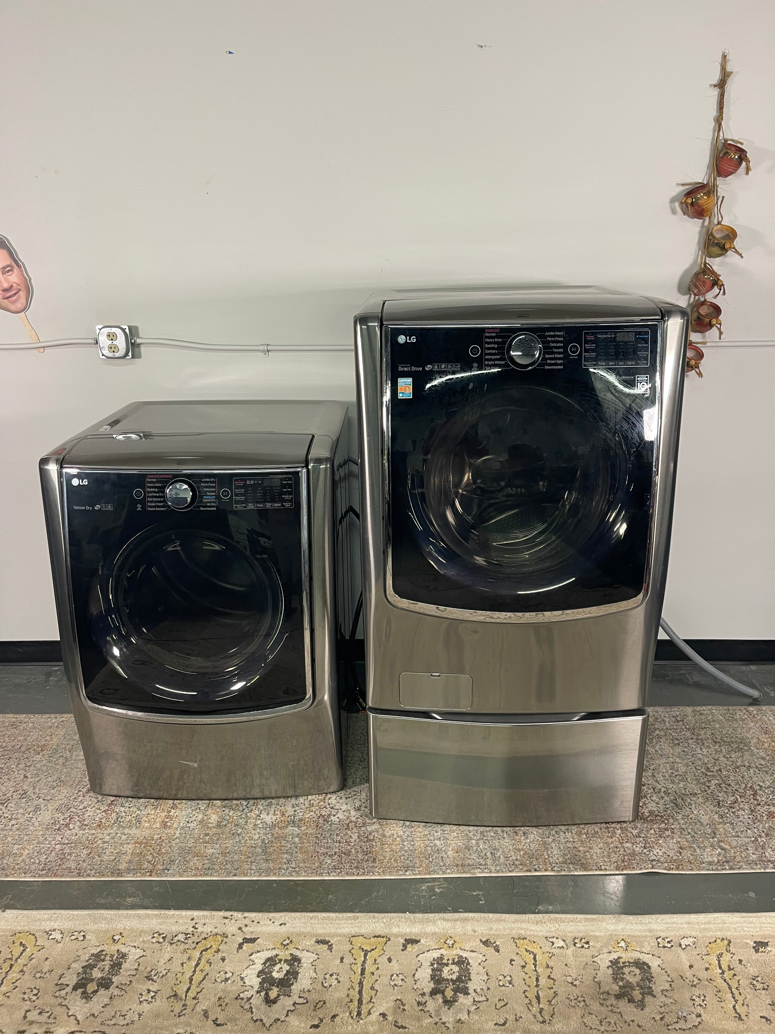 LG Mega Capacity Washer and Electric Dryer Set with Pedestals