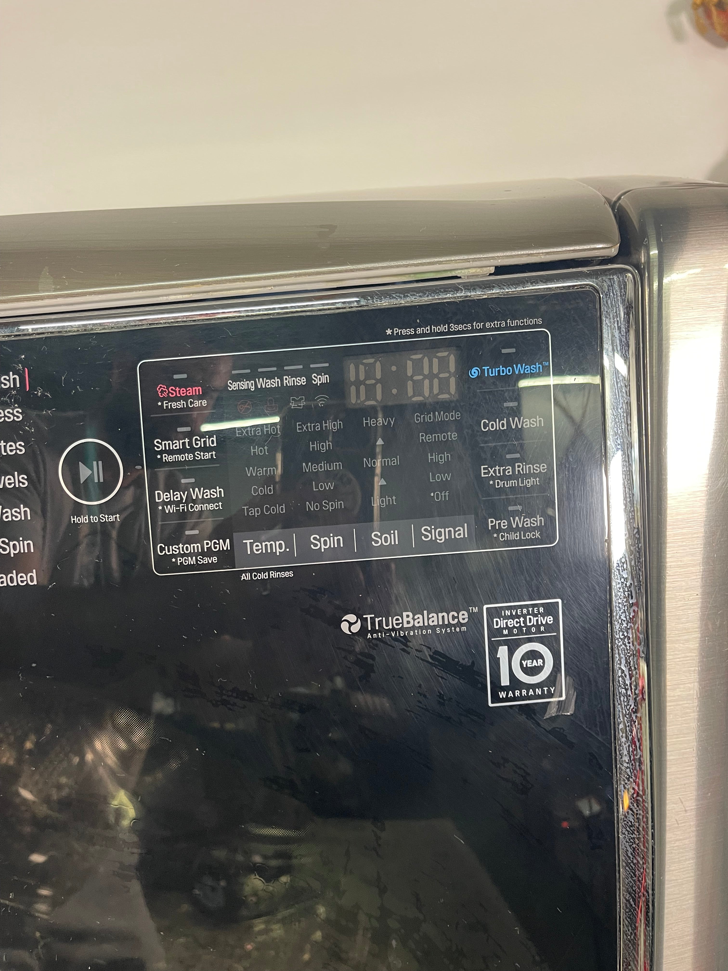 LG Mega Capacity Washer and Electric Dryer Set with Pedestals