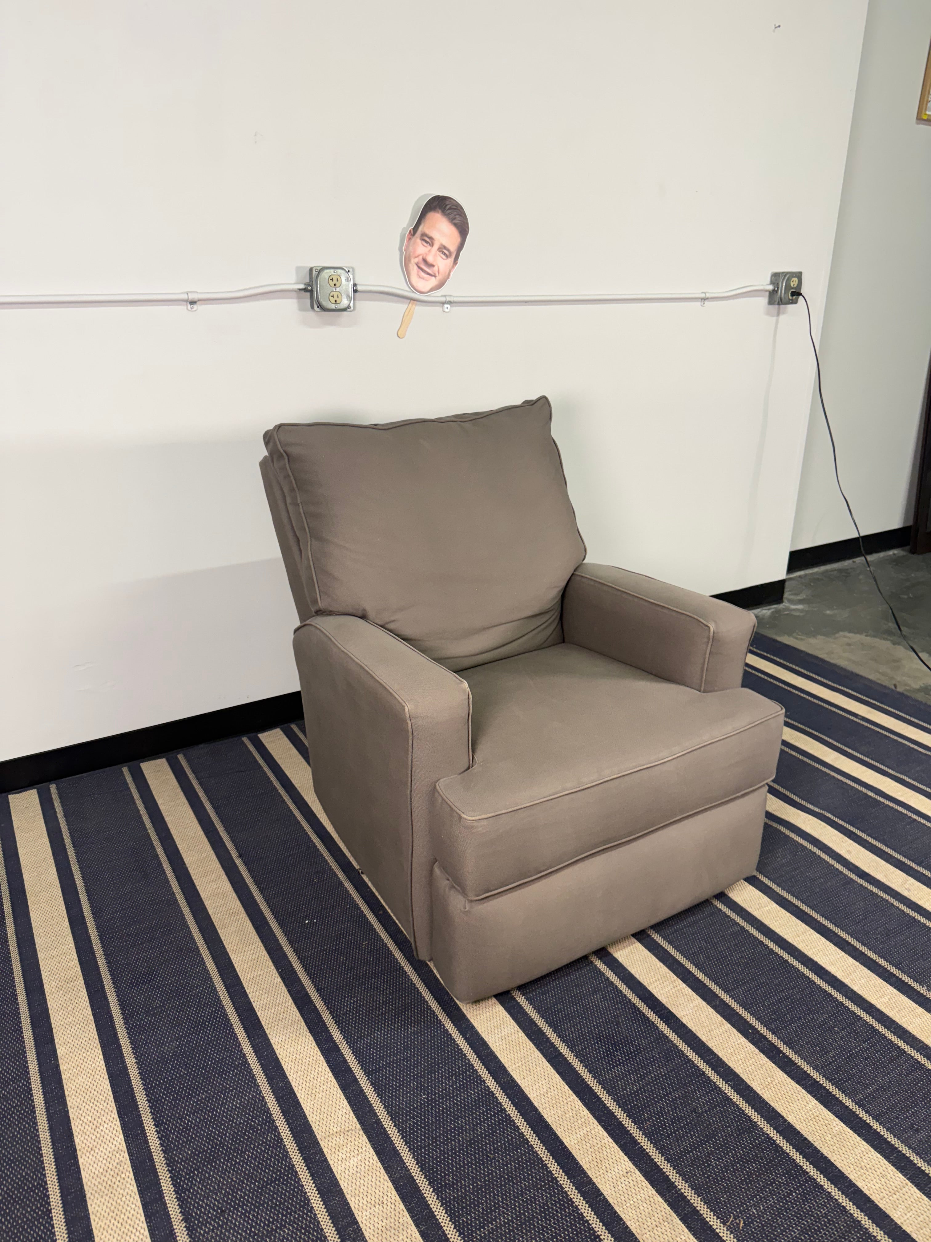 Taupe Upholstered Swivel Glider Chair